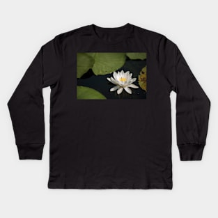 Beautiful white waterlily in the Danube Delta, Romania, on summer day Kids Long Sleeve T-Shirt